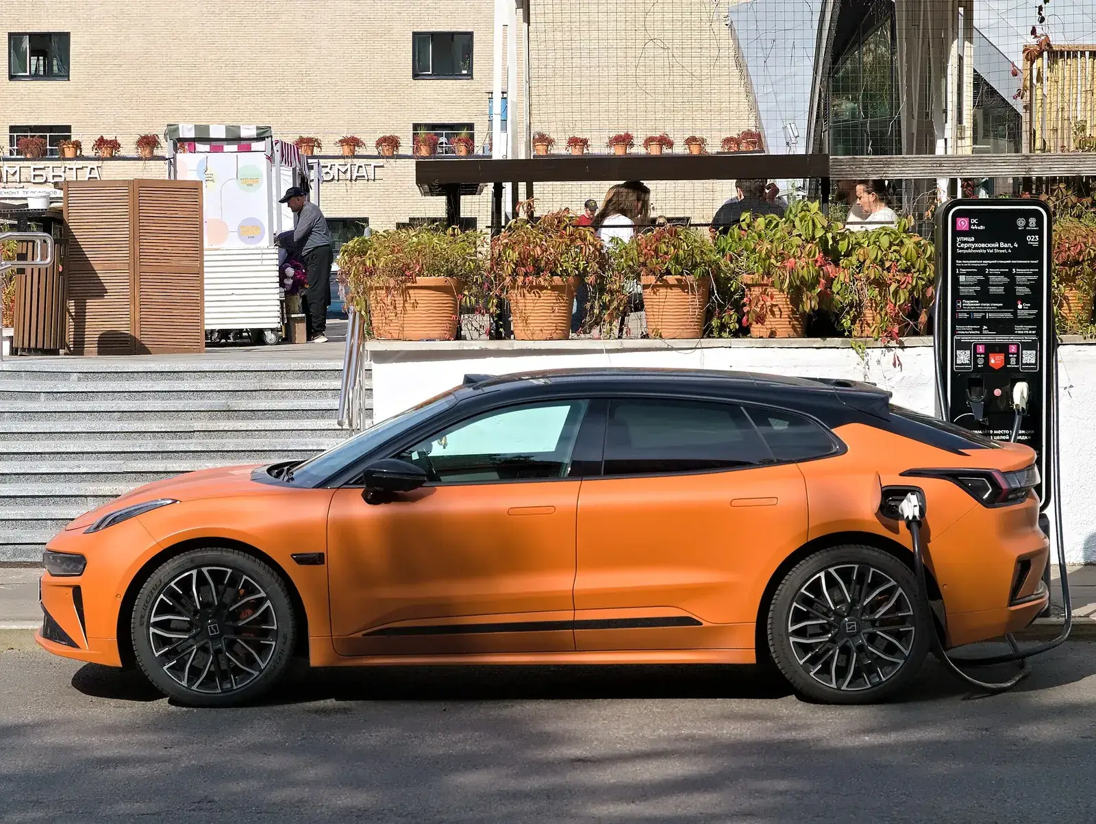 Orange Zeekr 001 electric shooting brake