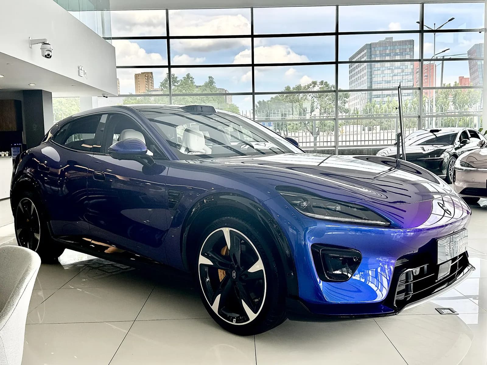 Luxeed RX in blue, three-quarter view