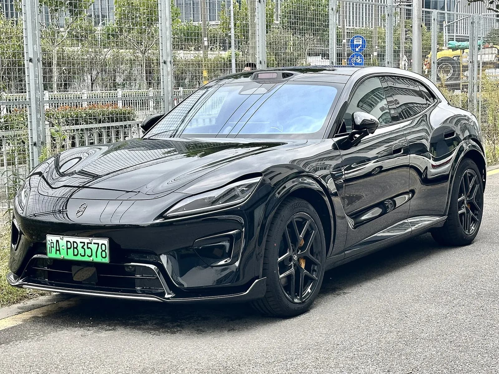 Luxeed RX in black, front three-quarter view